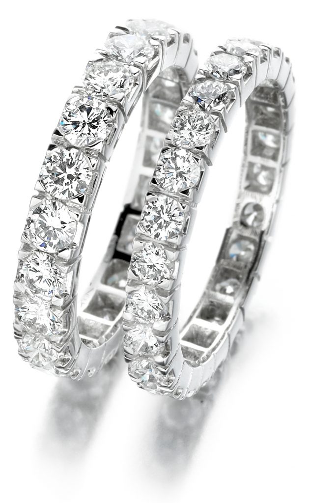image of 2 silver diamond rings
