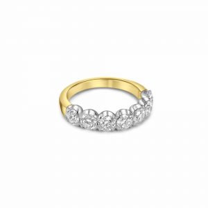 image of a gold ring with diamonds on top